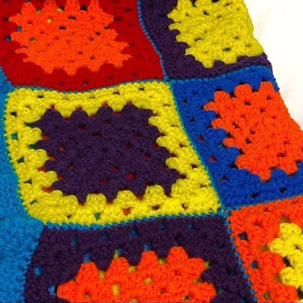 Hand crocheted bright multi colored Afghan size 56” X 31”
